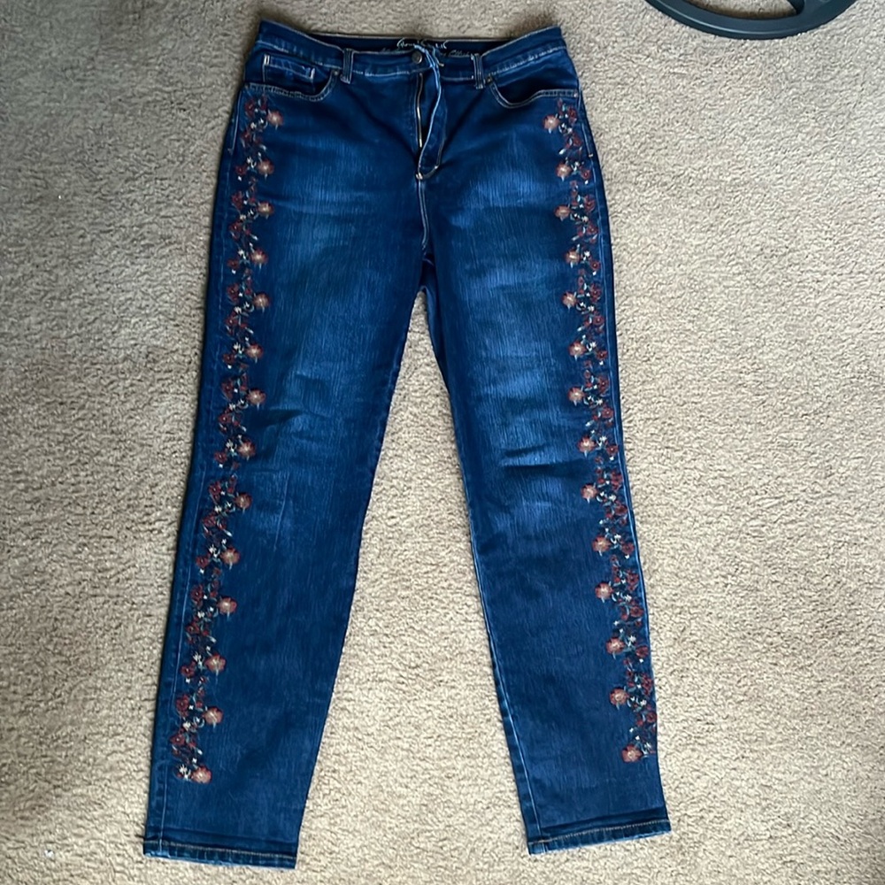 Blue jeans straight legged with floral pattern